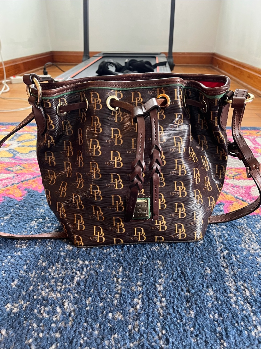 Dooney & Bourke Brown Logo Drawstring Crossbody Bag with Red Lining